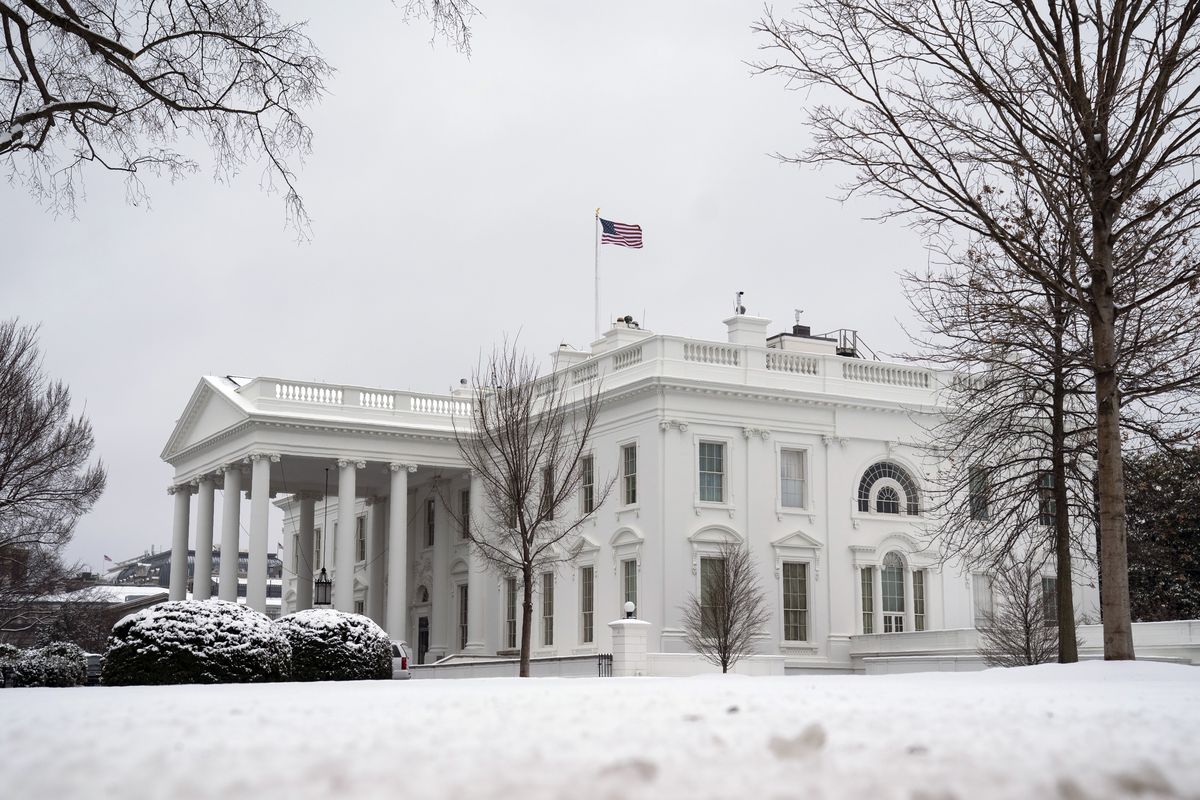 In this Feb. 1, 2021, photo, snow covers the ground at the White House in Washington. Only a fragment of Americans believe democracy is thriving in the U.S., even as broad majorities agree that representative government is one of the country’s bedrock principles, according to a new poll from The Associated Press-NORC Center for Public Affairs Research. Just 16% of Americans say democracy is working well or extremely well, a pessimism that spans the political spectrum.  (Evan Vucci)