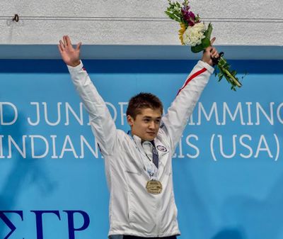 Daniel Roy, a senior at Gonzaga Prep, celebrates his gold at in the 200-meter breaststroke at the World Junior Championships in Indianapolis in August. Roy  ranks 36th in the world in the event in all age groups. (Michael Roy / Courtesy)