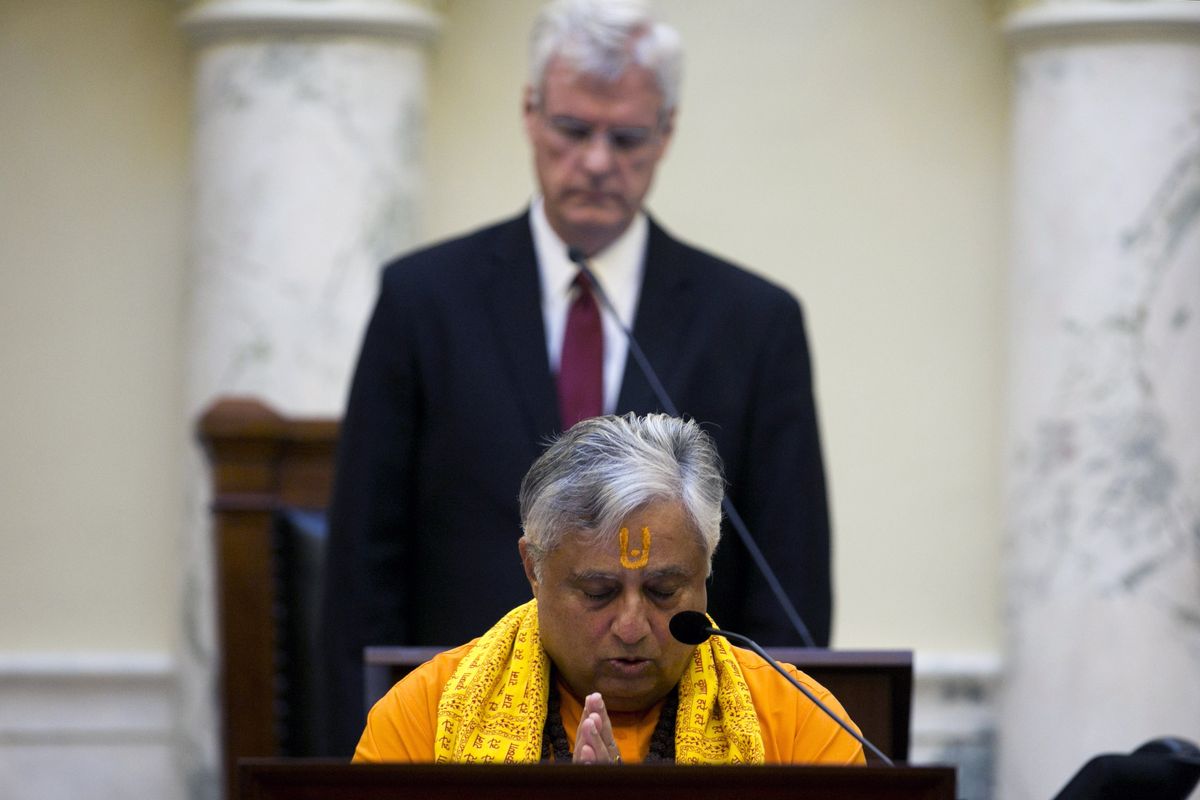 Rajan Zed, president of Universal Society of Hinduism, delivers a prayer from Sanskrit scriptures before the Idaho Senate on Tuesday in Boise. (Associated Press)