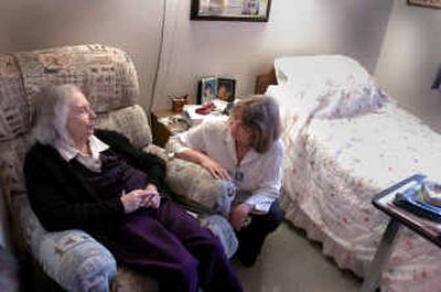 
Ombudsman Jan Young, right, talks with LaCrosse Health and Rehabilitation Center resident Mickey Henkle Friday about the living conditions at her facility. 
 (Jesse Tinsley / The Spokesman-Review)