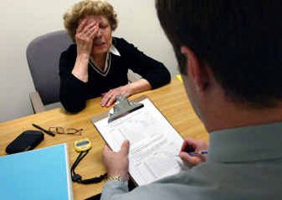 
Vivian Jones, 93, takes a test in which Dr. Raphael Ziegler gives her a number sequence that she must repeat backward. 