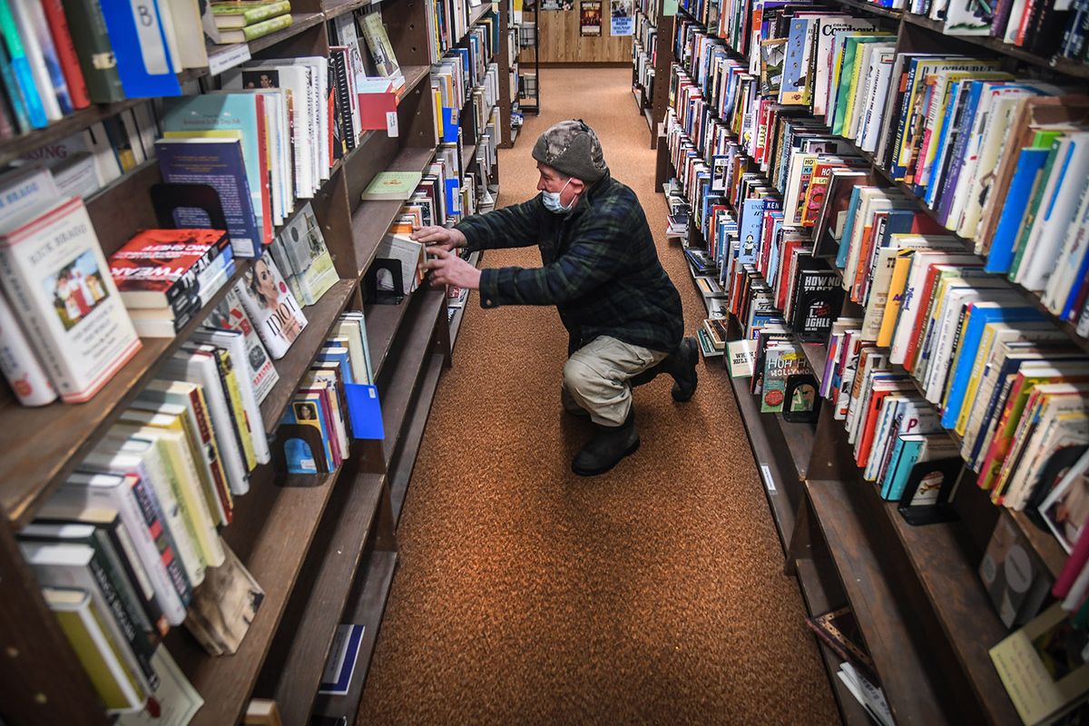 John Cady, of Worley, Id., came into 2nd Look Books with a list of 23 titles he was wanting to find. He was unbale to locate any of the titles in the store, but found "the accidental millionare. How to succed in life without really trying" by Gary Fong..  (Dan Pelle/THESPOKESMAN-REVIEW)