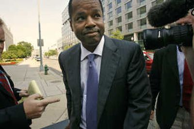 
Administrative law judge Roy Pearson leaves court after the second day of his trial in Washington on Wednesday.Associated Press
 (Associated Press / The Spokesman-Review)
