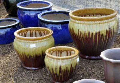 
Containers of all shapes, sizes and colors can spruce up a yard.
 (The Spokesman-Review)