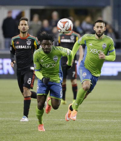 Will Obafemi Martins, left, and Clint Dempsey, right, play today? (Associated Press)