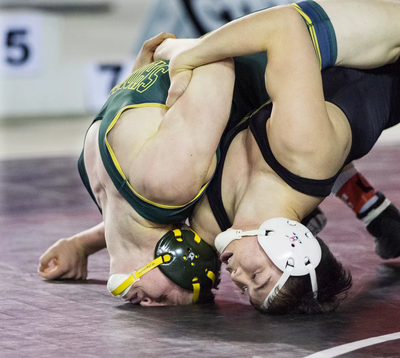 University’s Q’Veli Quintanilla, right, works against Shorecrest’s Thomas Rhodes during their State 3A 145-pound match. Quintanilla became a two-time state champ.   (Patrick Hagerty/For The Spokesman-Review)