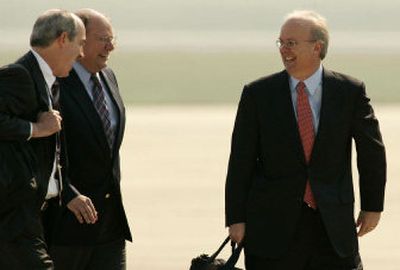 
Presidential adviser Karl Rove, right,  and White House aides J.D. Crouch II,  left, and Joseph Hagin head to Air Force One on Thursday.
 (Associated Press / The Spokesman-Review)