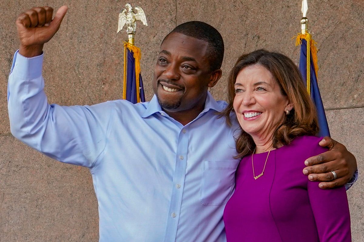 FILE - State Sen. Brian Benjamin embraces Gov. Kathy Hochul during an event in the Harlem, New York, after she made him lieutenant governor, Aug. 26, 2021. Hochul