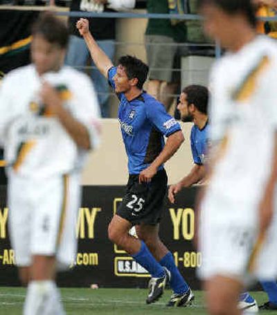 
San Jose Earthquakes' Brian Ching, center, celebrates after scoring a goal against the Los Angeles Galaxy earlier this season.
 (Associated Press / The Spokesman-Review)