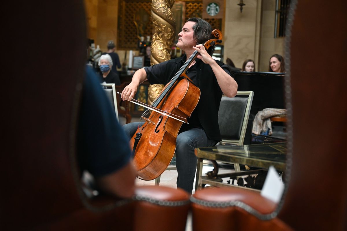 Zuill Bailey performs with his cello during a free BachFest concert, Tuesday, July 19, 2022 in the historic Davenport Hotel lobby.  (Dan Pelle/The Spokesman-Review)