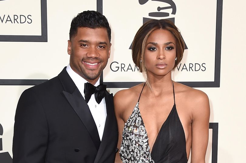 In this Feb. 15, 2016,  photo, Seattle Seahawks football player Russell Wilson and singer Ciara arrive at the 58th annual Grammy Awards in Los Angeles. The couple were married Wednesday, July 6, 2016, at Peckforton Castle in Cheshire, England. (Jordan Strauss / Invision/AP)