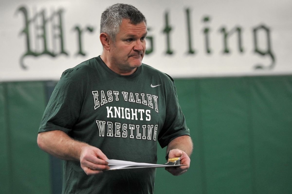 East Valley wrestling coach Craig Hanson instructs his athletes at team practice during January 2011. Hanson said fall wrestling season taking place this spring will be a modified one with time limits on close contacts. Masks will be worn because of the coronavirus pandemic.  (DAN PELLE/The Spokesman-Review)