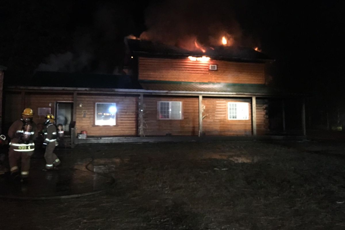 A family of three and four dogs escaped a house fire Wednesday morning in Deer Park. (Spokane County Fire District 4 / Courtesy photo)