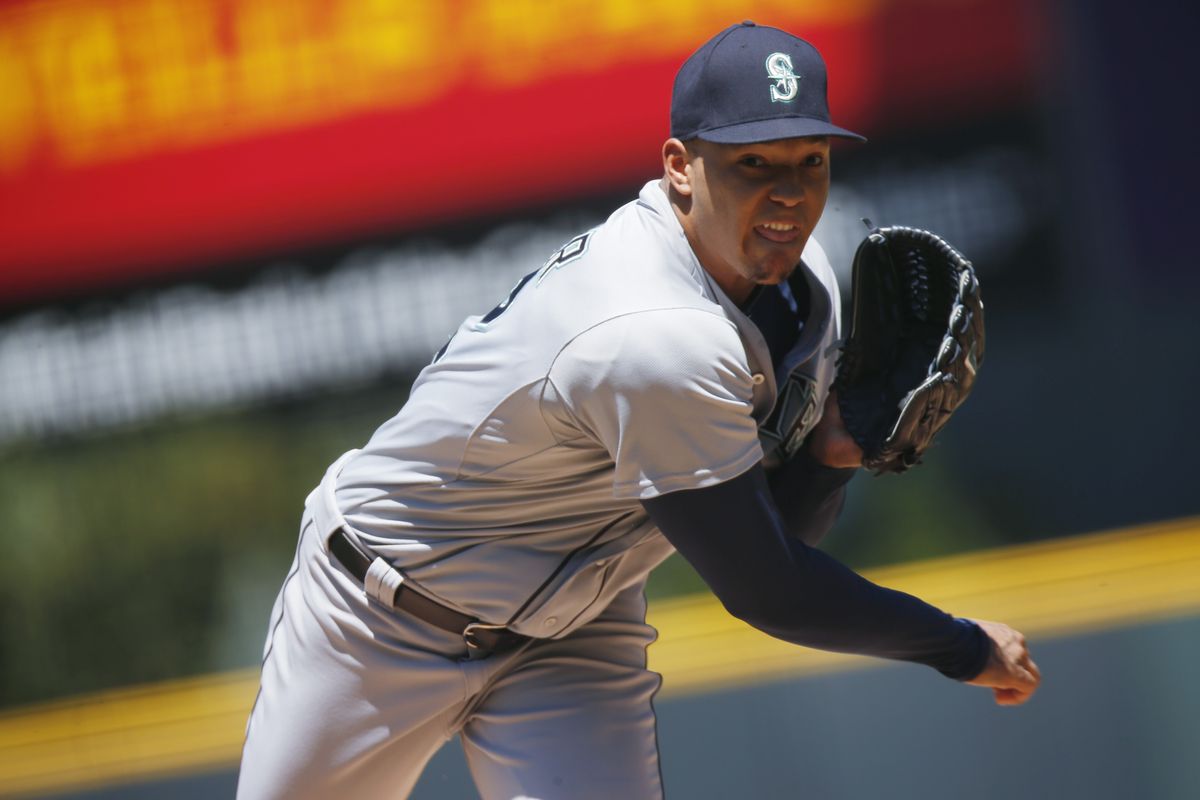 Mariners starter Taijuan Walker allowed three runs on five hits with five strikeouts over 7 1/3 innings against the Rockies in Denver on Wednesday. (AP)