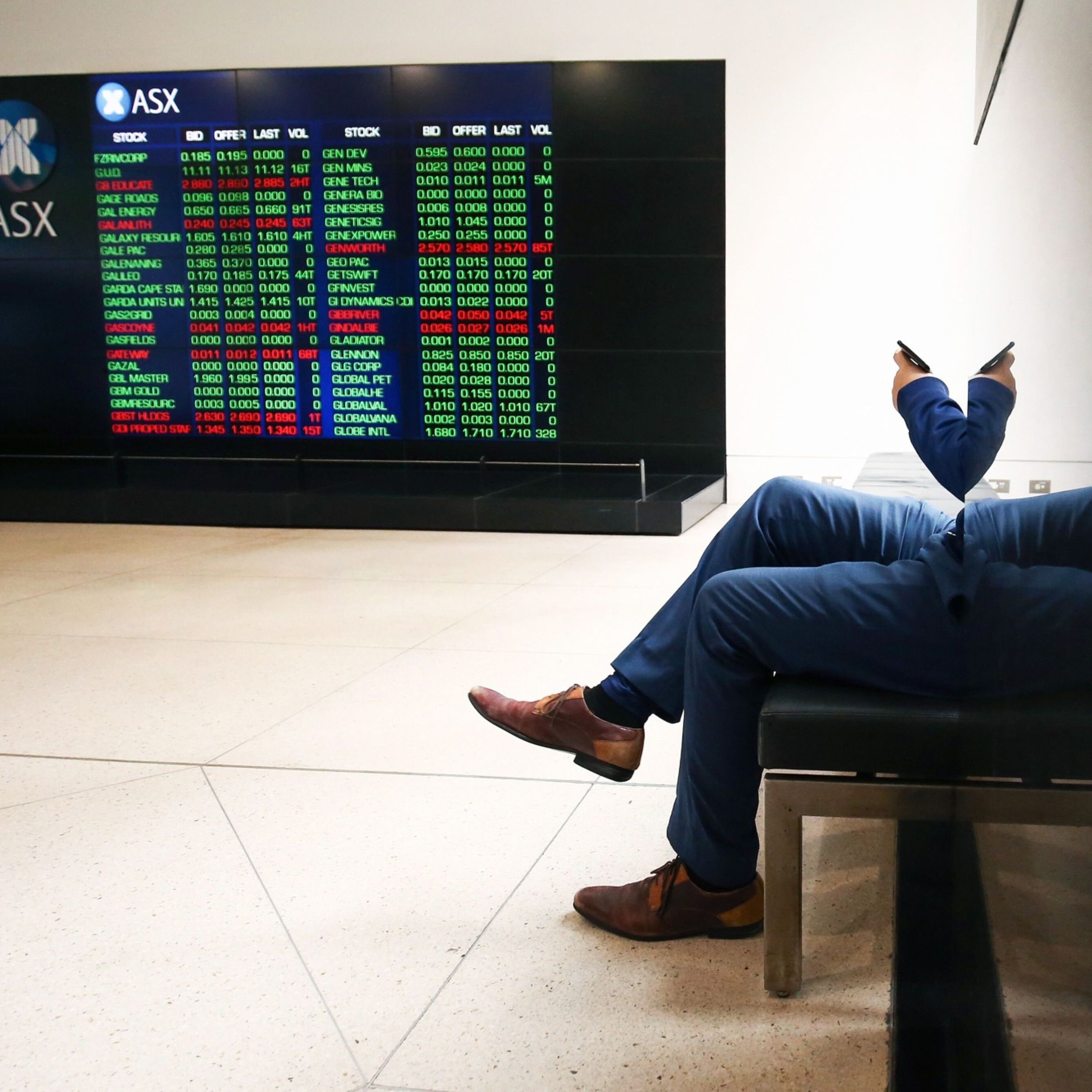 Stocks waver as traders weigh debt talks, Fed path