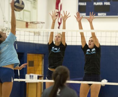 Maddie, center, and Sophie West, right, of Gonzaga Prep are nicknamed the 