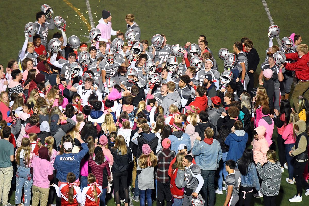 Ferris football players celebrate with student fans after beating Gonzaga Prep 34-0 during a GSL high school football game, Thurs., Oct. 17, 2019, at Joe Albi Stadium. Colin Mulvany/THE SPOKESMAN-REVIEW. (Colin Mulvany / The Spokesman-Review)