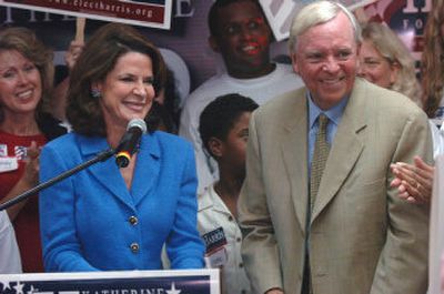 
Rep. Katherine Harris and her husband, Anders Ebbeson, join supporters following her victory in the primary election Tuesday. 
 (Associated Press / The Spokesman-Review)