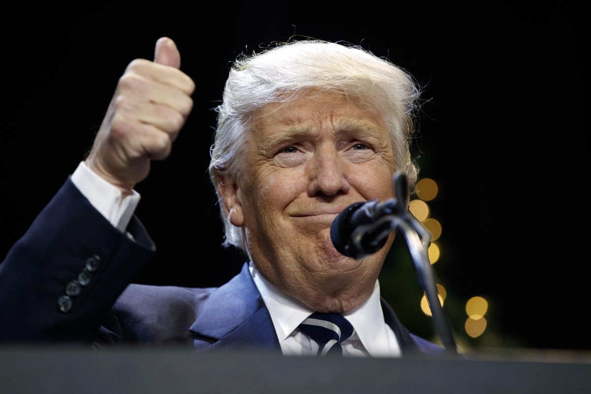 In this Dec. 13, 2016 file photo, President-elect Donald Trump gestures while speaking at a rally in West Allis, Wis. The forthcoming book, “Let Trump Be Trump,” paints a portrait of a campaign with an untested candidate and staff rocketing from crisis to crisis, in which the authors and a cast of mostly neophyte political aides learn on the fly and ultimately accept President Donald Trump’s propensity to go angrily off message. (Evan Vucci / Associated Press)