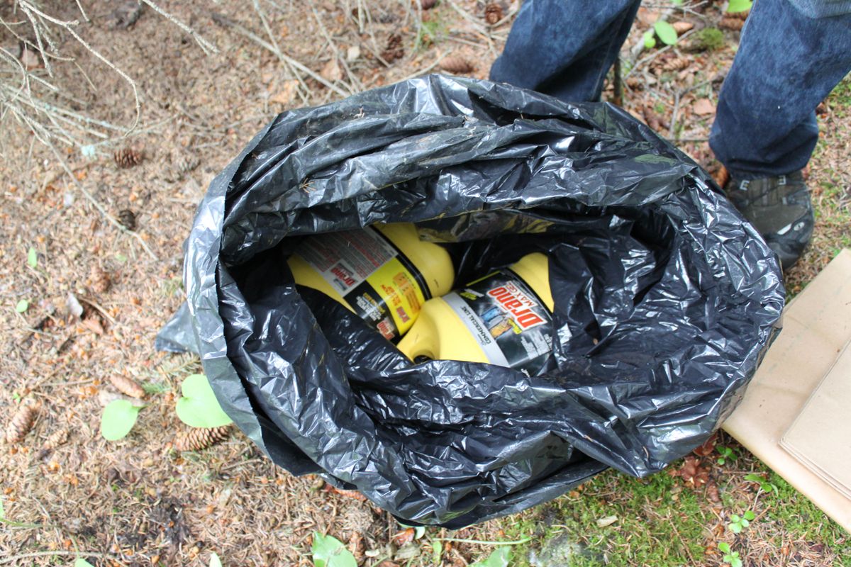 This undated photo provided by the FBI shows bottles of Drano found inside a plastic bag in Eagle River, Alaska, just north of Anchorage. The FBI says confessed Alaska serial killer Israel Keyes, who targeted people across the country, told authorities he planned to strike again in the state if he had gotten away with the murder of an 18-year-old Anchorage barista. (Fbi)