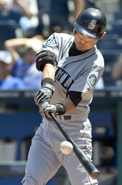 Seattle Mariners' Ichiro Suzuki doubles off Kansas City Royals starting pitcher Will Smith during the fifth inning of Thursday's game in Kansas City.
 (Associated Press)