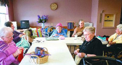 
From left, Beatrice Bartholet, Helen McMillan, Irene Bland, Loretta Miller, Mary Chandler and Florence Hart knit and crochet blankets  that will be donated to area veterans and others in need.  The Busy Needles is made up of Northpointe Retirement Community members.
 (HOLLY PICKETT PHOTOS / The Spokesman-Review)