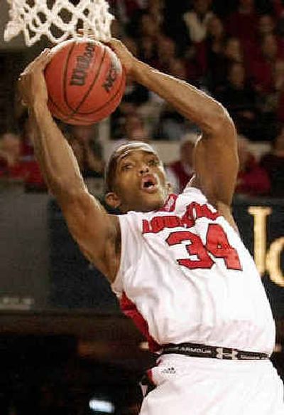 
 Larry O'Bannon scored 33 points as Louisville clinched a share of the Conference USA title. 
 (Associated Press / The Spokesman-Review)