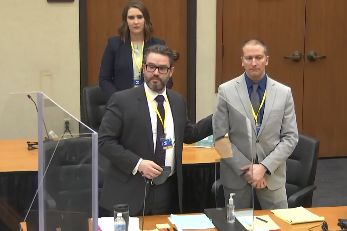 In this screen grab from video, defense attorney Eric Nelson, left, defendant and former Minneapolis police officer Derek Chauvin and Nelson’s assistant Amy Voss introduce themselves during (POOL)