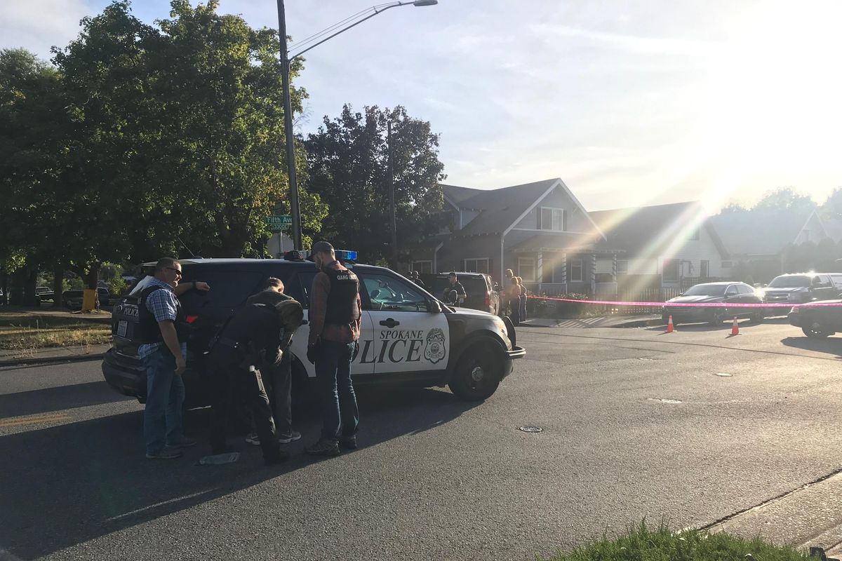 Police arrested a man in relation to a shooting on the 3200 block of West Fifth Avenue in Spokane on Wednesday evening, Sept. 25, 2019. (Emma Epperly / The Spokesman-Review)