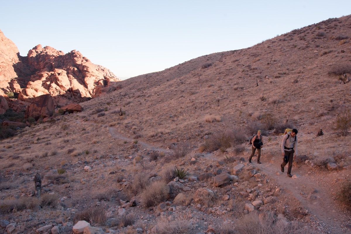 Bevie LaBrie, left, and Justin Hall hike at the Red Rock Canyon National Conservation Area on Dec. 15, 2018. ELI FRANCOVICH/THE SPOKESMAN-REVIEW. (Eli Francovich / The Spokesman-Review)