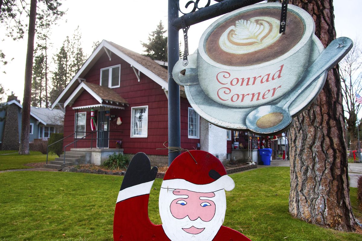 Passersby are greeted to Bob and Lillie Conrad’s Spokane Valley home, at the corner of Ninth Avenue and Herald Road, with a waving Santa Claus. The Conrads have collected an estimated 600 Santas over the past 30 years. (Dan Pelle / The Spokesman-Review)