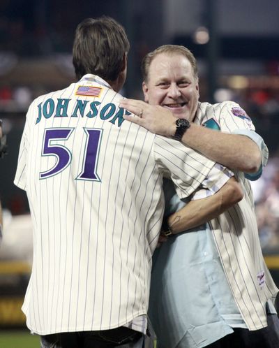 Former Diamondbacks pitchers Randy Johnson, left, and Curt Schilling were among those honored in Phoenix. (Associated Press)
