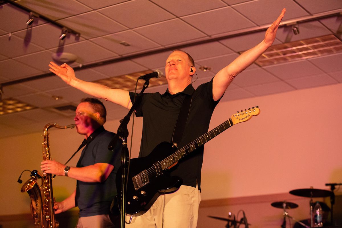 Lead singer Paul Hemenway performs with Black Happy during a show at a Coeur d’Alene Best Western on Aug. 1, 2018. The eight-piece band was a huge hit in the 1990s, playing rock and metal with a horn section. (Libby Kamrowski / The Spokesman-Review)