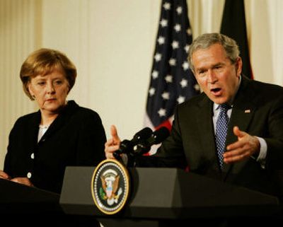 
President Bush holds a joint press conference Friday with German Chancellor Angela Merkel in the White House. 
 (Associated Press / The Spokesman-Review)