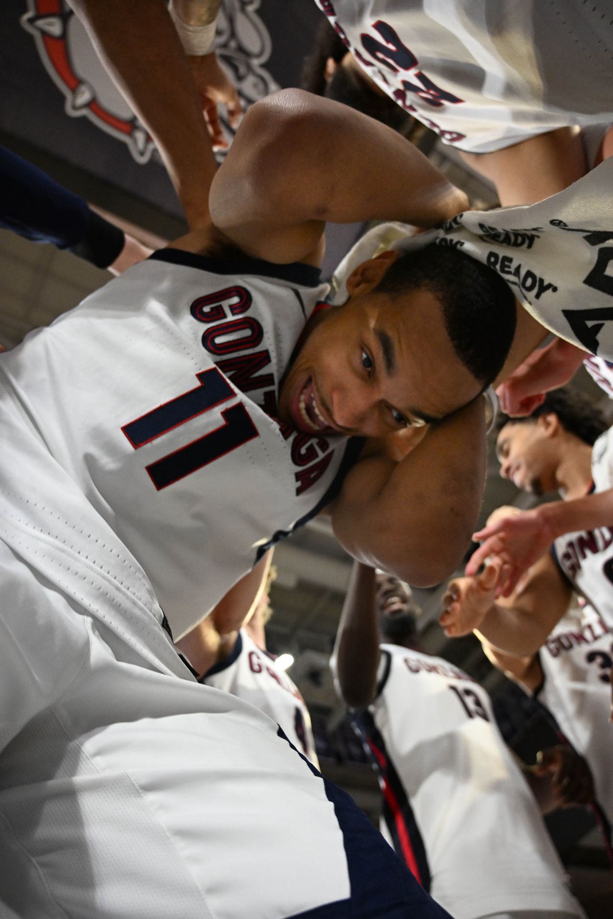 Gonzaga’s Nolan Hickman is razzed by teammates after being named player of the game in the Zags’ rout over LMU on Tuesday.  (By Colin Mulvany/The Spokesman-Review)