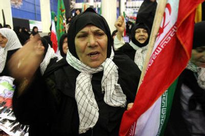 
Iranian women chant slogans during a gathering to support Iran's leaders and the nuclear program near Tehran on Sunday.
 (Associated Press / The Spokesman-Review)
