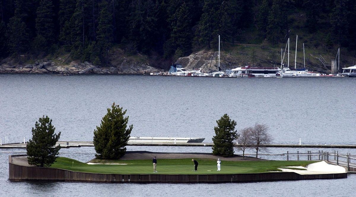 Installing new sod on the Coeur d’Alene Resort’s floating green was quite a process. (Jesse Tinsley / The Spokesman-Review)