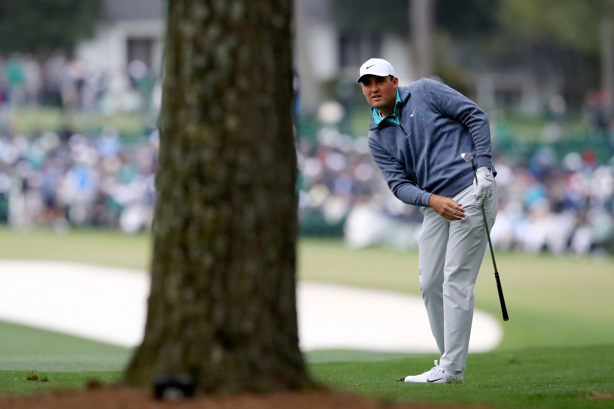 Scottie Scheffler, the leader by three shots, reacts after missing a birdie putt on the 15th green during the third round at the Masters on Saturday in Augusta, Ga.  (Associated Press)