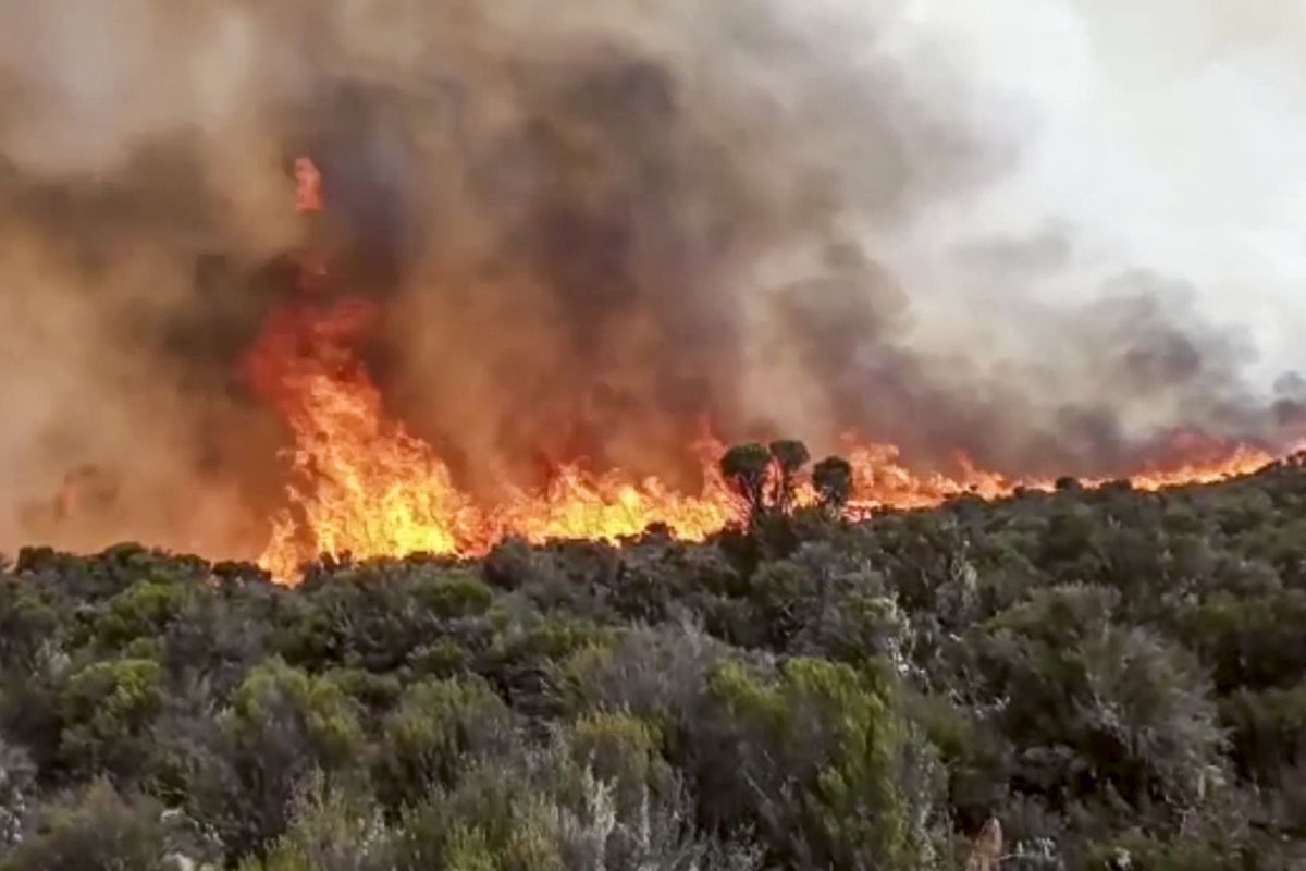 Fires burn on Mount Kilimanjaro in Tanzania on Monday.  (STR)