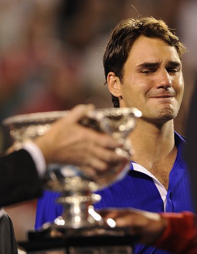 Roger Federer lost control of his emotions during the trophy presentation.  (Associated Press / The Spokesman-Review)