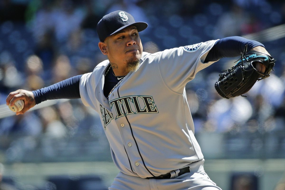 Mariners’ Felix Hernandez delivers a pitch during the first inning on Saturday. (Frank Franklin II / Associated Press)