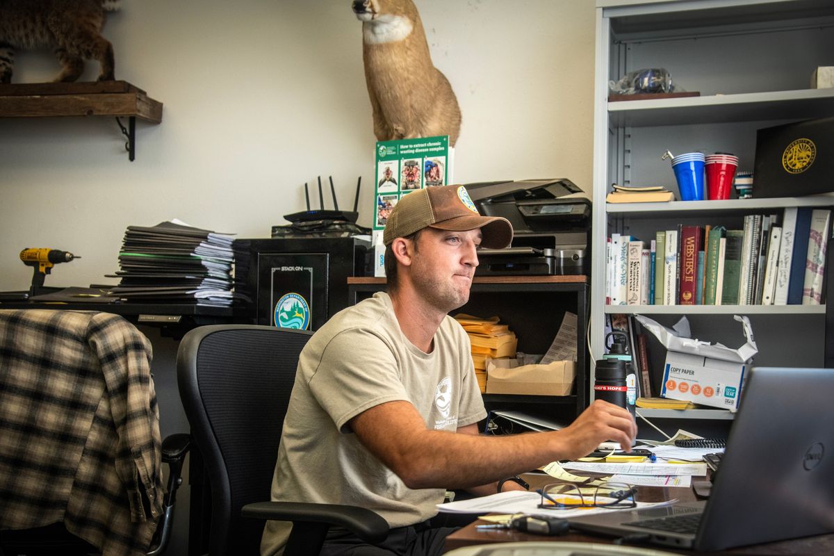 Dean Nizer, a private lands biologist for the Washington Department of Fish and Wildlife, works in his office on Aug. 14 in St. John, Wash.  (Michael Wright/THE SPOKESMAN-REVIEW)