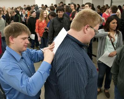 Job candidates at the March 2014 Silverwood Theme Park job fair in Coeur d’Alene. (Dan Pelle / The Spokesman-Review)