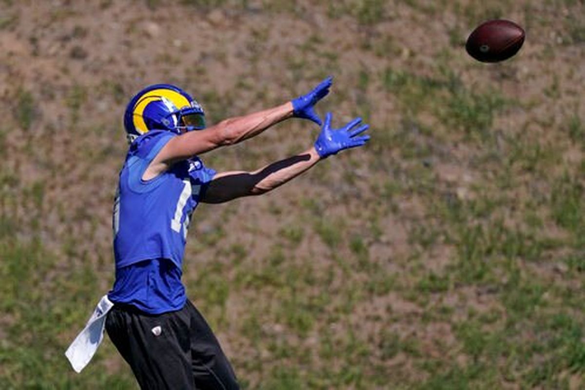 Los Angeles Rams wide receiver Cooper Kupp catches a pass during practice for an NFL Super Bowl football game Friday, Feb. 11, 2022, in Thousand Oaks, Calif. The Rams are scheduled to play the Cincinnati Bengals in the Super Bowl on Sunday.  (Mark J. Terrill)