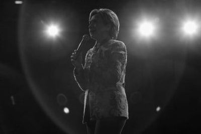 
Democratic presidential hopeful Sen. Hillary Clinton, D-N.Y., speaks during a fundraiser in Washington on Tuesday. 
 (Associated Press photos / The Spokesman-Review)