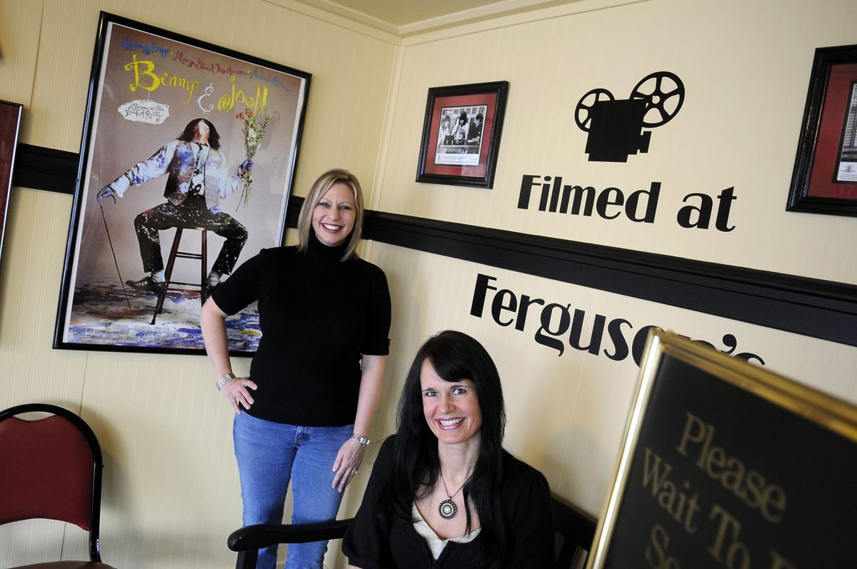 Kristen Fail, left, and Amy Larson are the designers  behind the remodel at Ferguson’s Cafe in Spokane’s Garland district.  (DAN PELLE Photos / The Spokesman-Review)