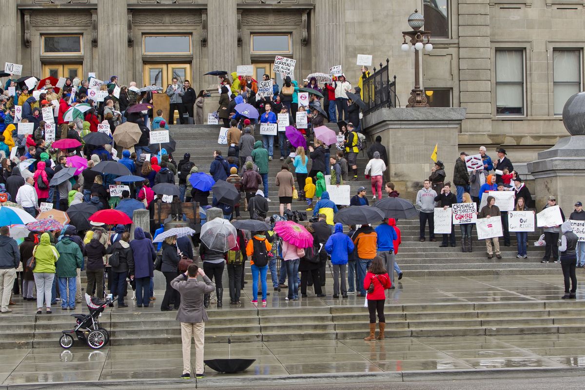 About 300 people gather on the steps of the Idaho Statehouse in Boise, Idaho to protest SB1254, a bill seeking to allow concealed weapons on the state