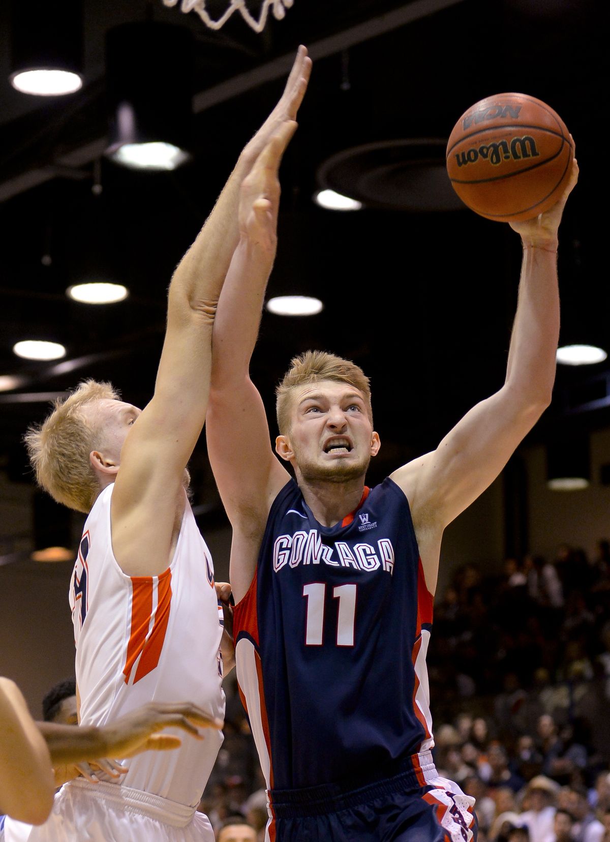 Gonzaga forward Domantas Sabonis drives past Pepperdine’s Jake Johnson for two of his 18 points. (Associated Press)