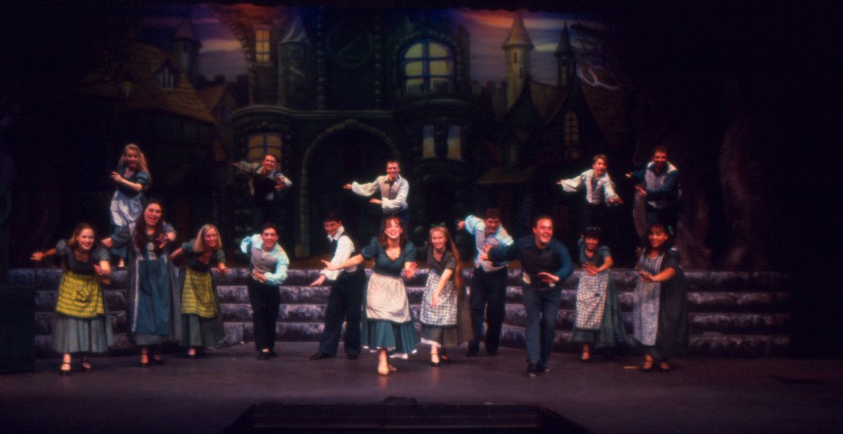 Lacey Bohnet, pictured here the last girl on the right, was in "Wizard of Oz" at Spokane Civic Theatre with her best friend Kasey Graham, pictured here in the back row middle, in 1997. Both have continued in the theater as adults. Graham is a music director and conductor with national touring shows and Bohnet often acts in Spokane Civic Theatre productions. (Courtesy of Spokane Civic Theatre / The Spokesman-Review)