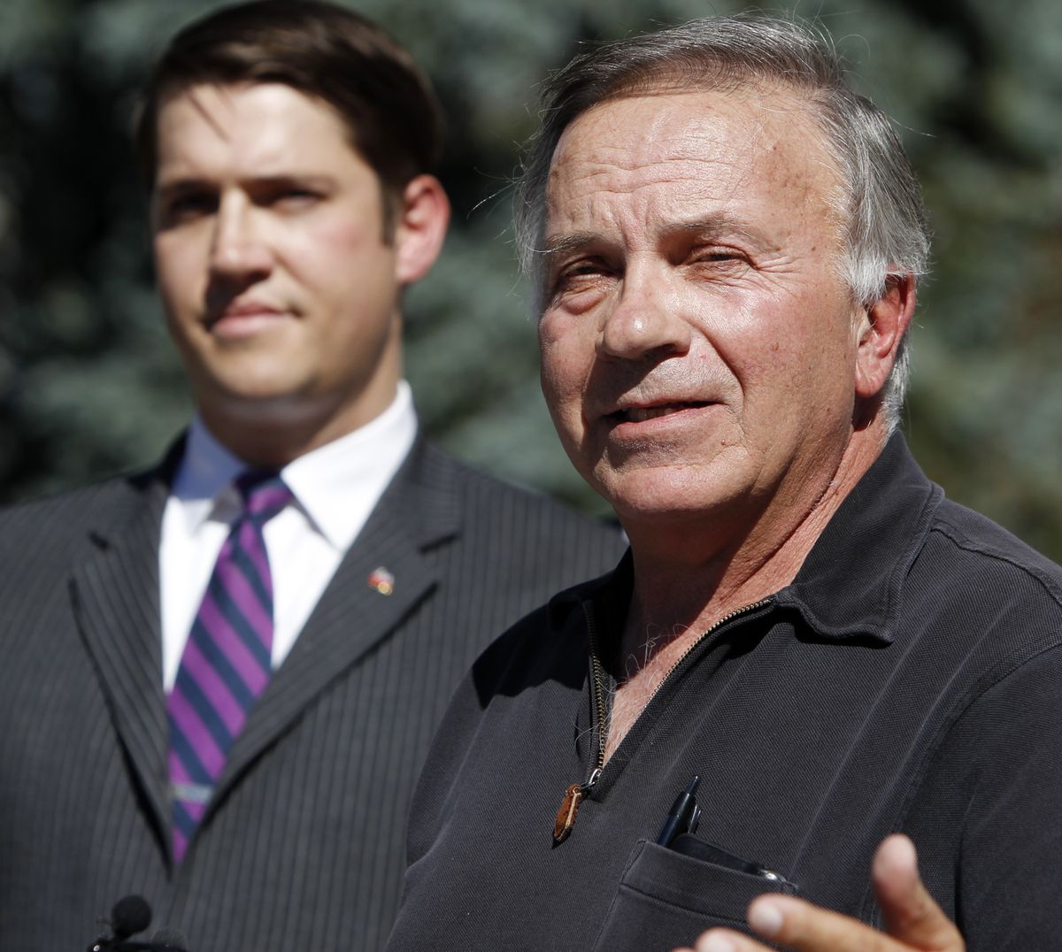 In this Oct. 2, 2012 photo, former Republican U.S. Rep. Tom Tancredo speaks out in favor supporting Amendment 64 to legalize marijuana in Colorado during a news conference at the Capitol in Denver. Joe Megyesy coordinator for the campaign to regulate marijuana like alcohol listens at left. Appealing to Western individualism and a mistrust of federal government, activists have lined up some prominent conservatives as natural allies to make pot legal, from one-time presidential hopefuls Tom Tancredo and Ron Paul to Libertarian presidential candidate and former New Mexico Gov. Gary Johnson. (Ed Andrieski / Associated Press)